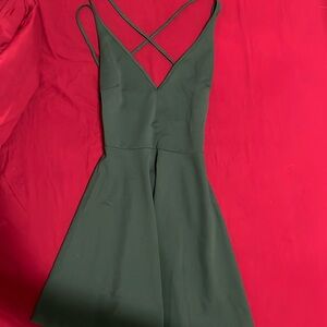 Green open back dress